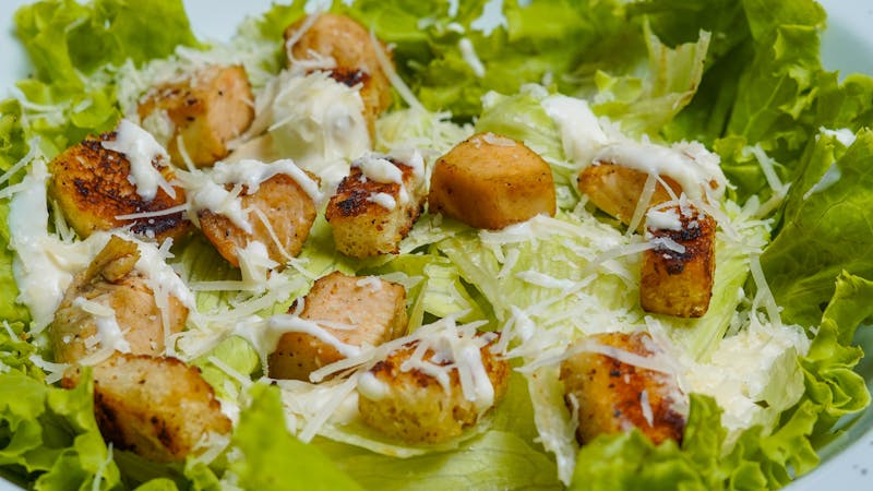 Classic Caesar salad with romaine, croutons, and parmesan